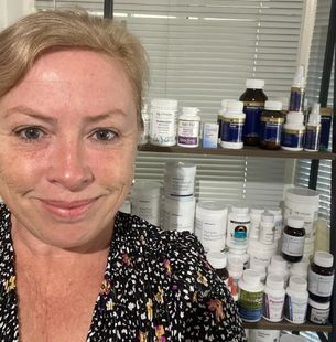 Photo of Katrina in front of high quality practitioner supplements